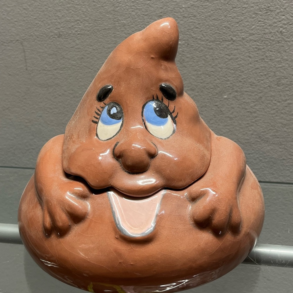 Playful Brown Ceramic Art Sculpture